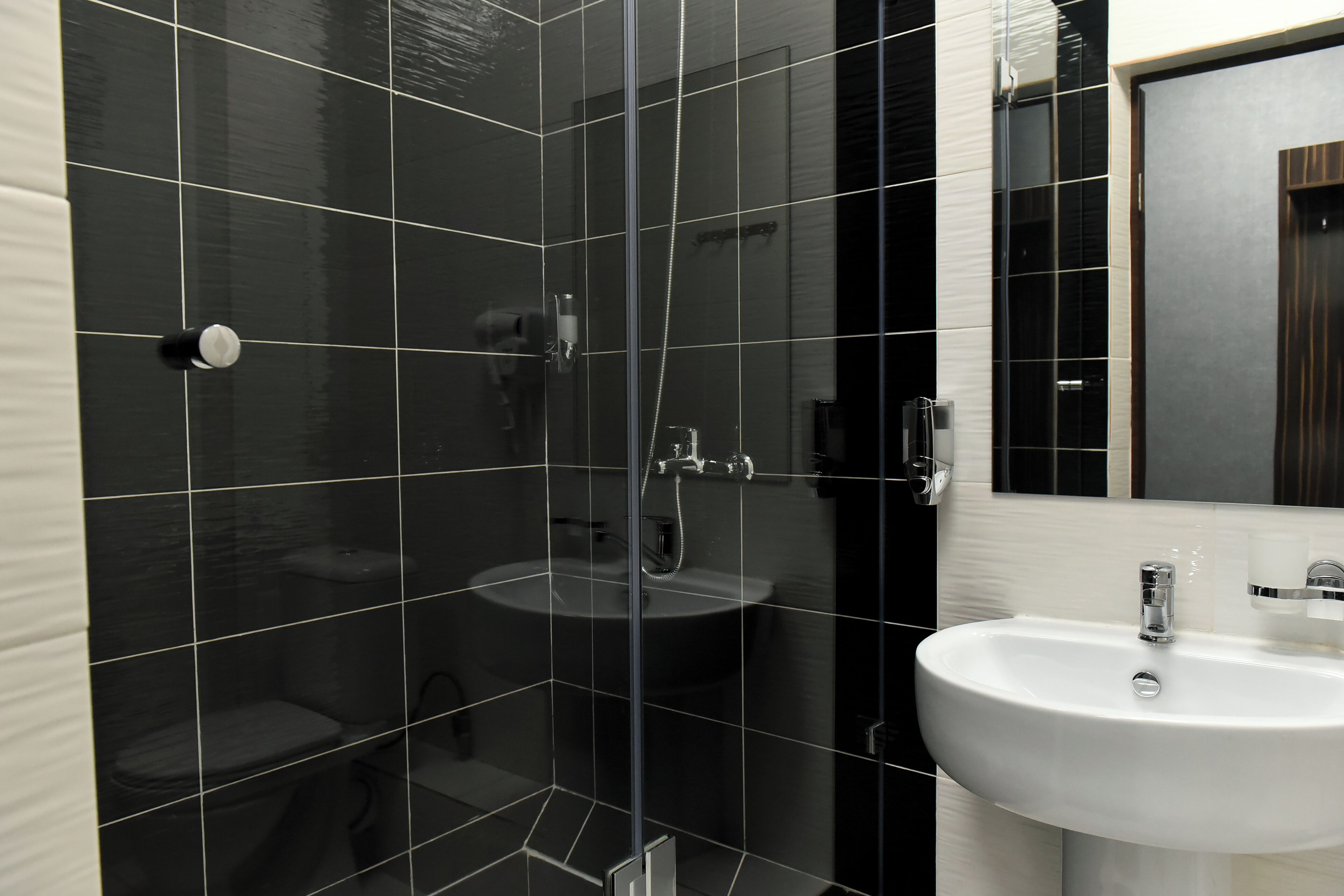 Standard Double Room | Bathroom | Shower, free toiletries, hair dryer, slippers