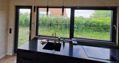 Large modern holiday home with pool close to the beach