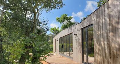 Large modern holiday home with pool close to the beach