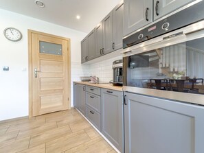 Oven, dishwasher, dining tables