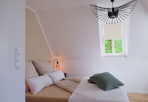 2 bedrooms, travel crib, WiFi, bed sheets