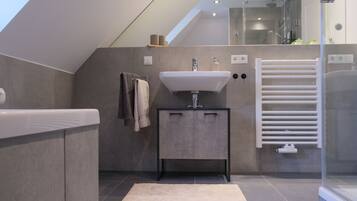 Hair dryer, towels, soap, shampoo