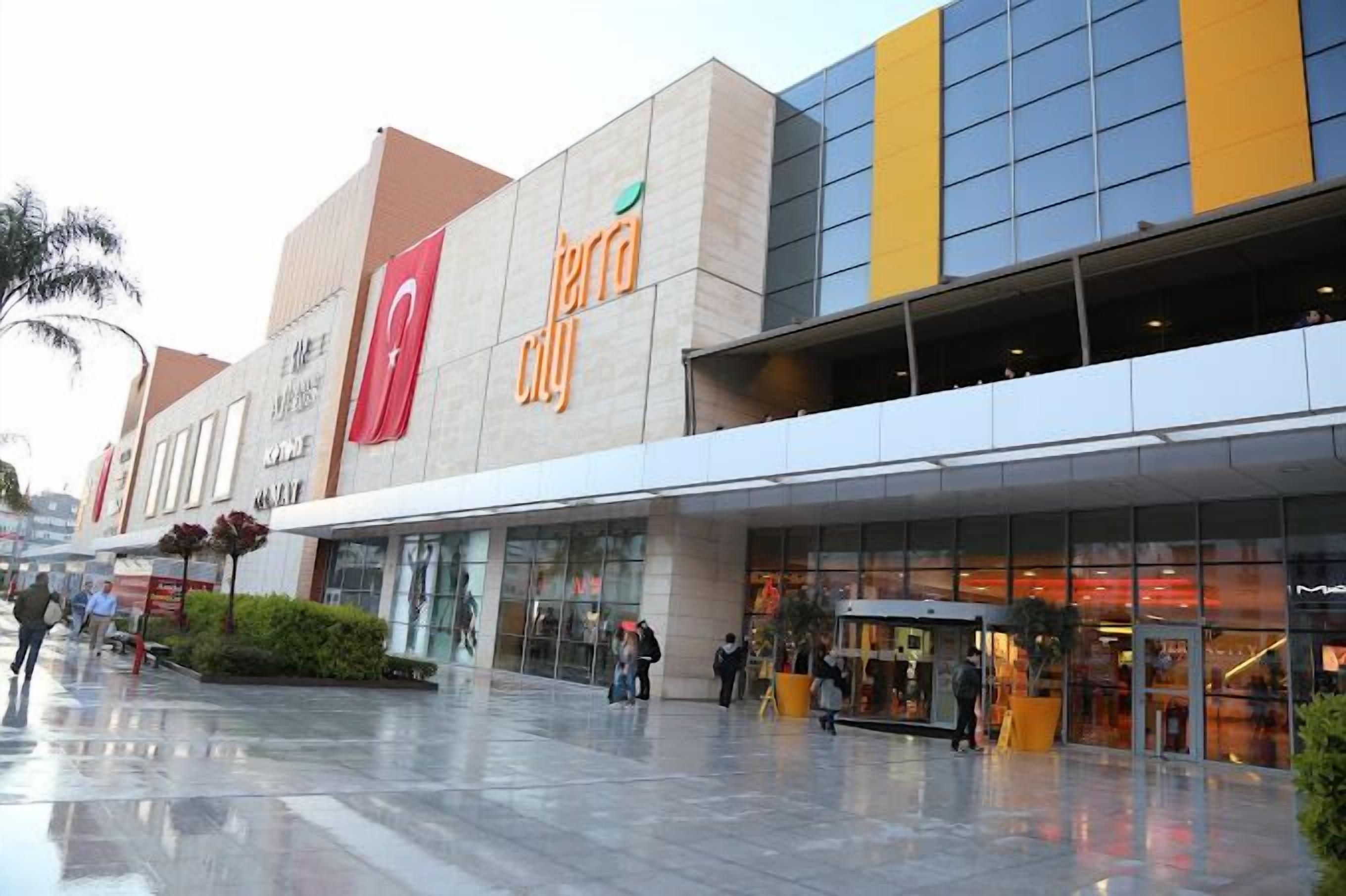 A modern shopping mall with a prominent Terra City sign.