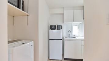 Fridge, microwave, cookware/dishes/utensils