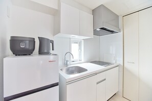 Fridge, microwave, cookware/dishes/utensils