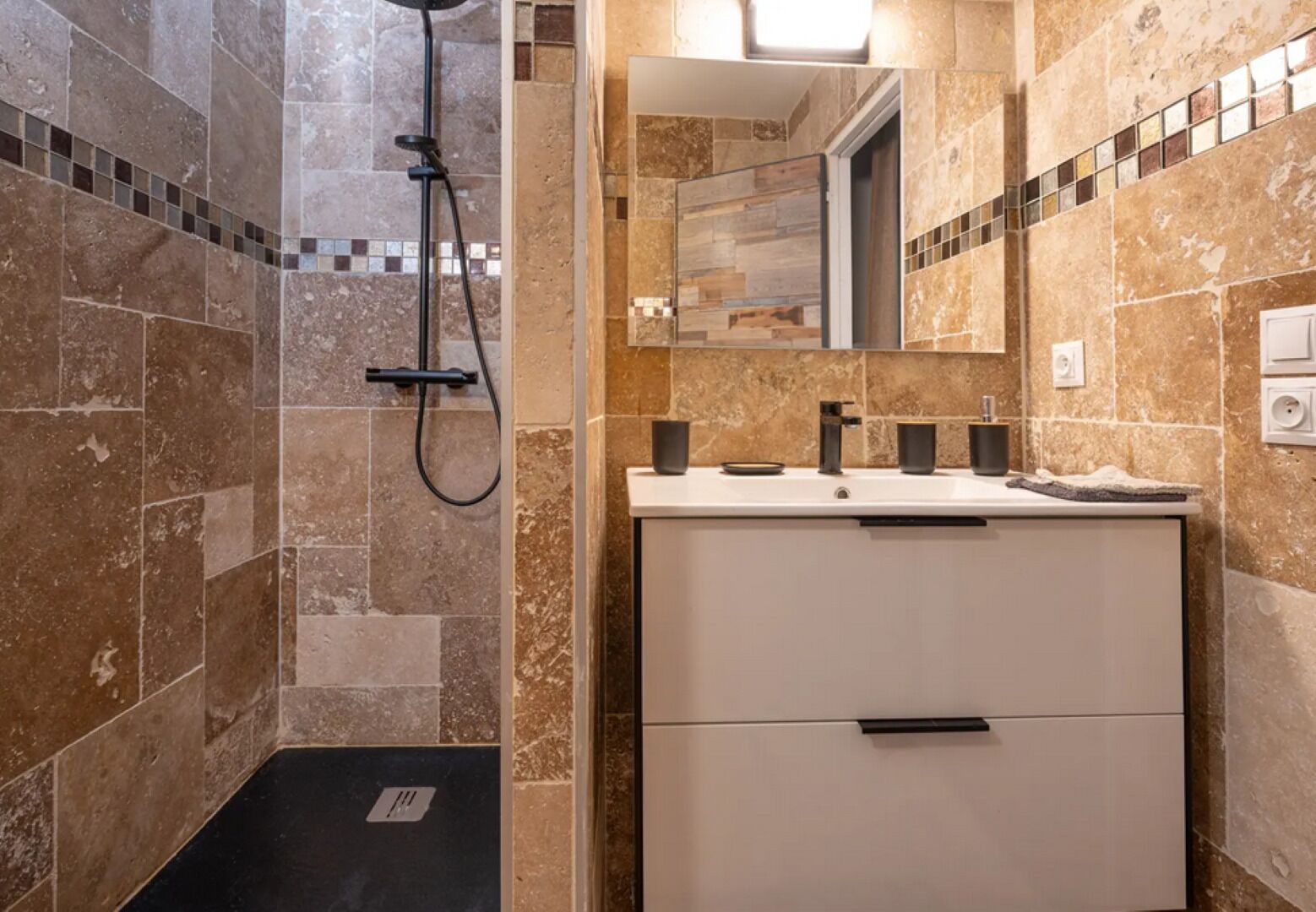 Shower, hair dryer, towels, toilet paper