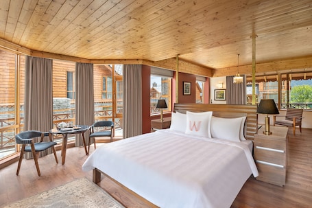 Premium bedding, down comforters, pillowtop beds, in-room safe