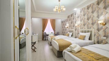 Deluxe Room, 3 Twin Beds | 1 bedroom, in-room safe, desk, laptop workspace