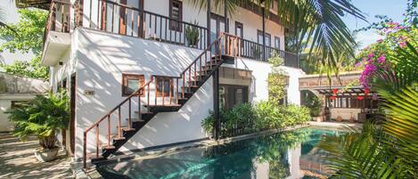 Outdoor pool, open 7:00 AM to 7:00 PM, pool umbrellas, sun loungers