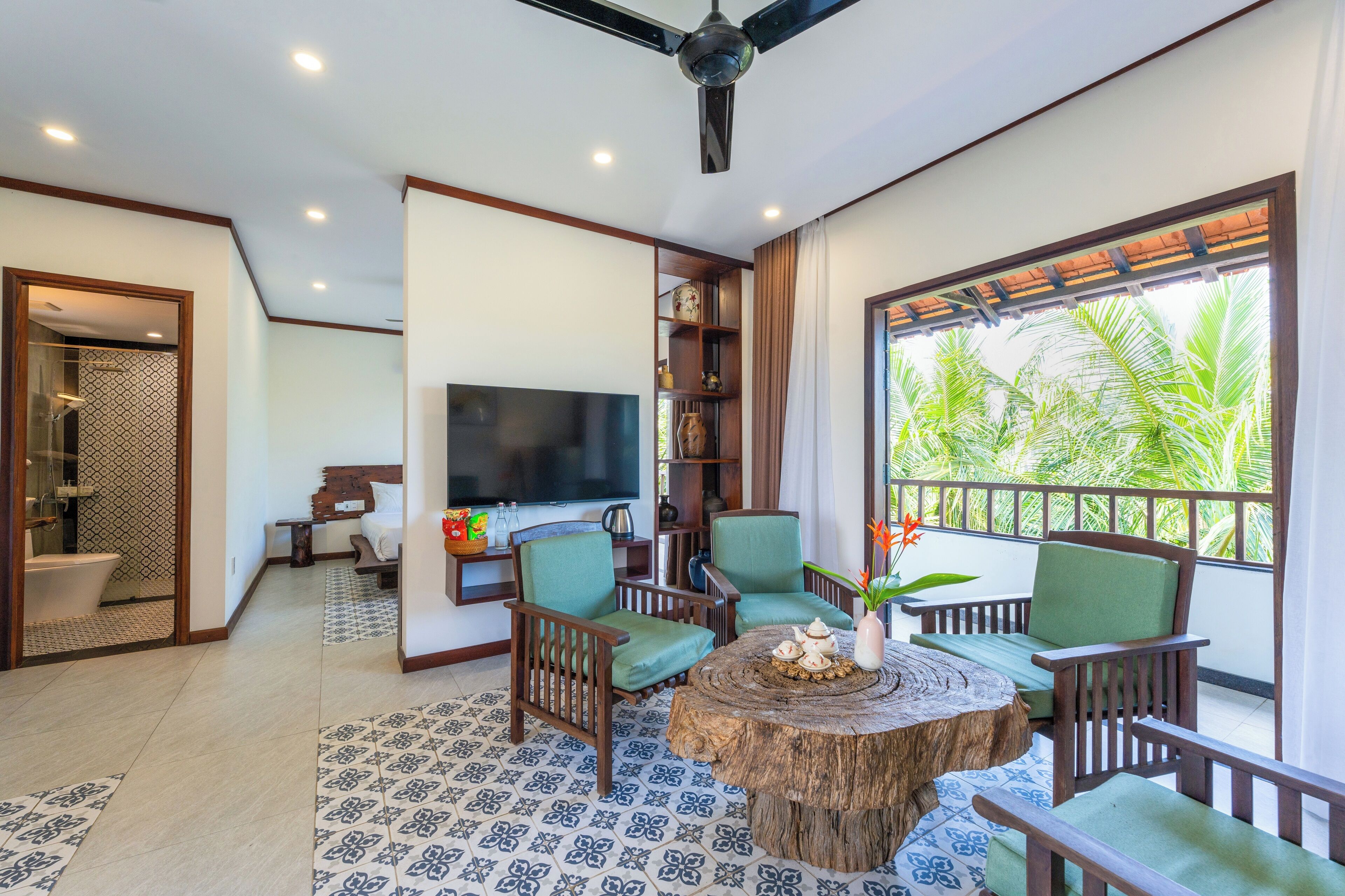 Junior Room, 1 Queen Bed, Balcony | Living room | 27-inch LCD TV with satellite channels