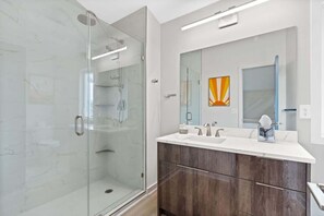 Combined shower/tub, hair dryer