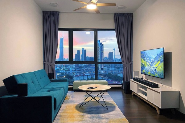 Welcome to La Gente Comfy Stay and we wish you have a very pleasant and cozy stay here at our home~ Here is our living area with 55" 4K HDR TV, very nice surround speakers system and amazing KL city view, all yours to enjoy~