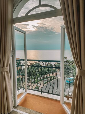 Deluxe Quadruple Room, Balcony, Beach View | Balcony - La Palma Hotel & Spa Sunset Town Phu Quoc (Phu Quoc)
