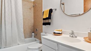 Hair dryer, towels, soap, toilet paper