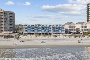 On the beach, sun-loungers, beach towels