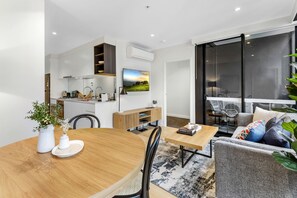 Dining - Stylish 2BR/2BA Southbank apt with full kitchen, plush furnishings, pool, gym, BBQ terrace, supermarket. Perfect for long or short stays, just minutes to Crown, Convention Centre, Marvel Stadium, Southbank Promenade, Fed Square & Flinders Station. (Southbank)