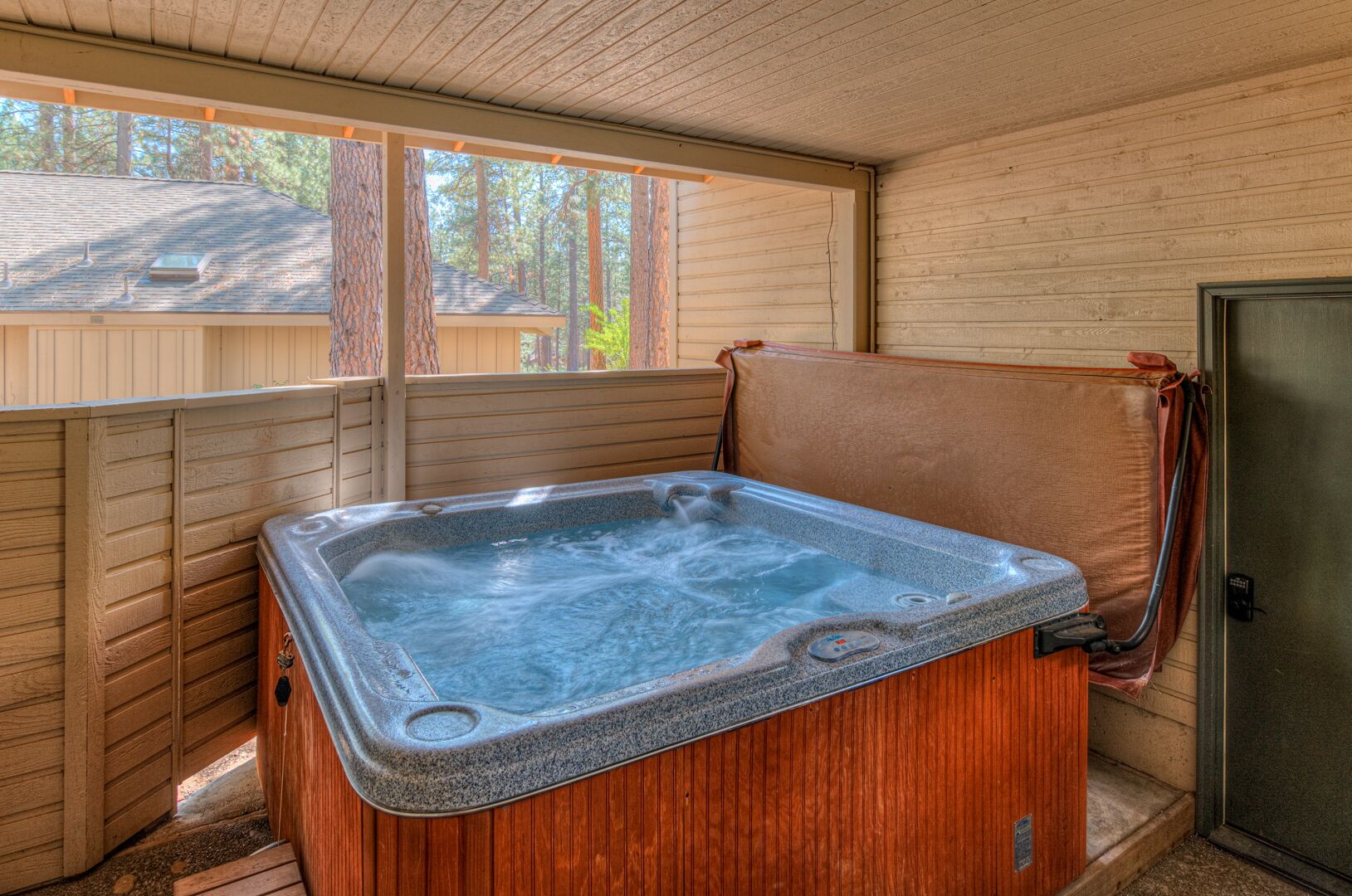 Private hot tub, A/C, all new furniture and beds, close to playground! No pets