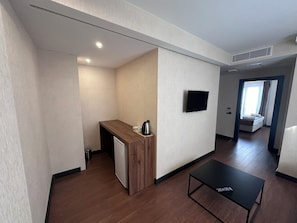 Deluxe Suite, 1 Bedroom, Private Bathroom, Partial Sea View | Living area | TV, heated floors - Star Suit Hotel (Trabzon)
