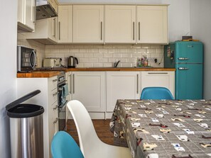 High chair, cookware/dishes/utensils, freezer