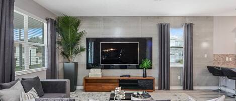 Téléviseur, table de baby-foot