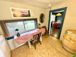 Dining - Charming rustic cabin with shared lake access and golf course views. (Polson)