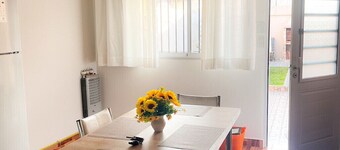 Complete house with garage and patio with barbecue