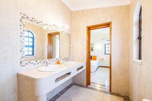 Bathtub, hair dryer, towels