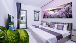 A modern bedroom with a large bed, two bedside tables, a large window, and a wall-mounted TV. - NatalieLe's Homestay (Phu Quoc)