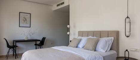 Junior Double Room | Living area | 32-inch LCD TV with cable channels