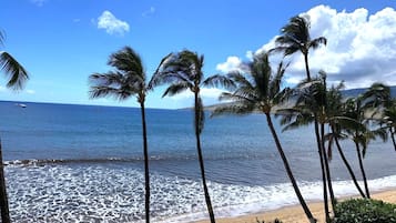On the beach, sun loungers, beach towels