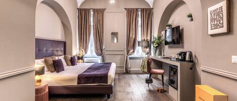 Suite junior | 3 habitaciones, ropa de cama de alta calidad y minibar