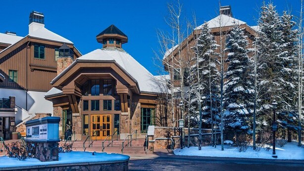 A lodge with a stone facade, wooden accents, and a snow-covered roof. - Hyatt Mountain Lodge Beaver Creek, Colorado - Prime Ski & Summer Weeks Available (Avon)