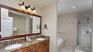 A bathroom with two sinks, a large mirror, and a glass shower enclosure. - Hyatt Mountain Lodge Beaver Creek, Colorado - Prime Ski & Summer Weeks Available (Avon)