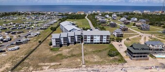 New Listing-Open weeks in prime summer time! Cozy condo, ocean views & pool.  