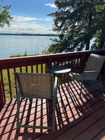Property grounds. Cozy lake cabin with your own private dock. Secluded lot close to the city!
