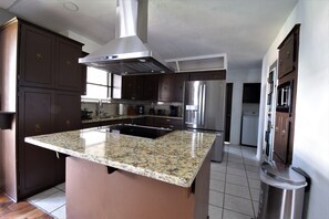 Private kitchen - Nice and spacious home with a movie theater for entertainment and relaxation. (Oklahoma City)