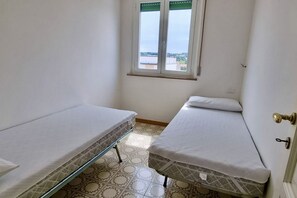 2 dormitorios y ropa de cama