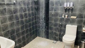 Shower, designer toiletries, hair dryer, bathrobes