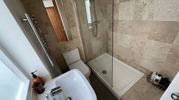 Hair dryer, towels, soap, shampoo
