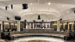 A lobby with a central seating area, a bar, and a reception desk. - Nile Cruise Aswoan & Luxor 3 & 4 Nights (Aswan)