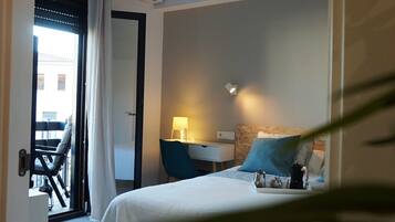 3 habitaciones, tabla de planchar con plancha y acceso a internet