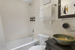 Hair dryer, towels, soap, shampoo