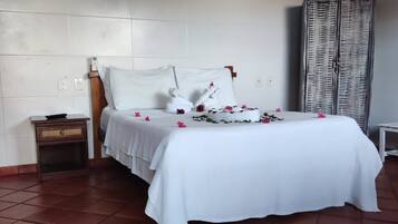 Habitación Confort con 1 cama matrimonial o 2 individuales | Área de sala de estar