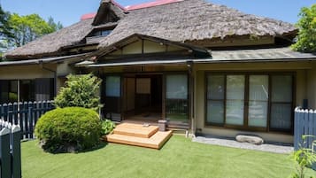Luxury Suite, Garden View | Terrace/patio