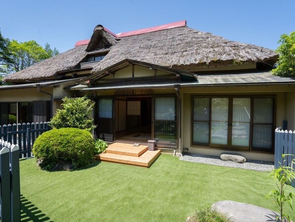 Luxury Suite, Garden View | Terrace/patio