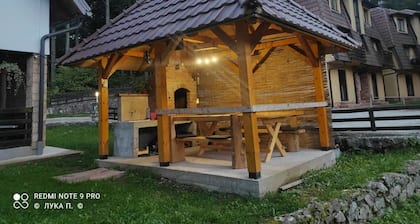 Studio Apartment with balcony and summer house with barbecue