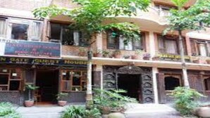 A building with a sign for "Golden Gate Guest House" and "The Golden Gate Hotel & Restaurant". - MeroStay 155 GGH (Bhaktapur)