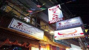 A building with multiple signs, including 'Trekker's Home' and 'Hotel Trekker's Home'. - MeroStay 153 TH (Kathmandu)