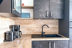 Geladeira, fogão, cooktop, lava-louças