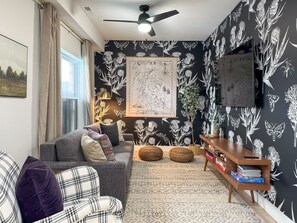 Smart TV, fireplace, foosball